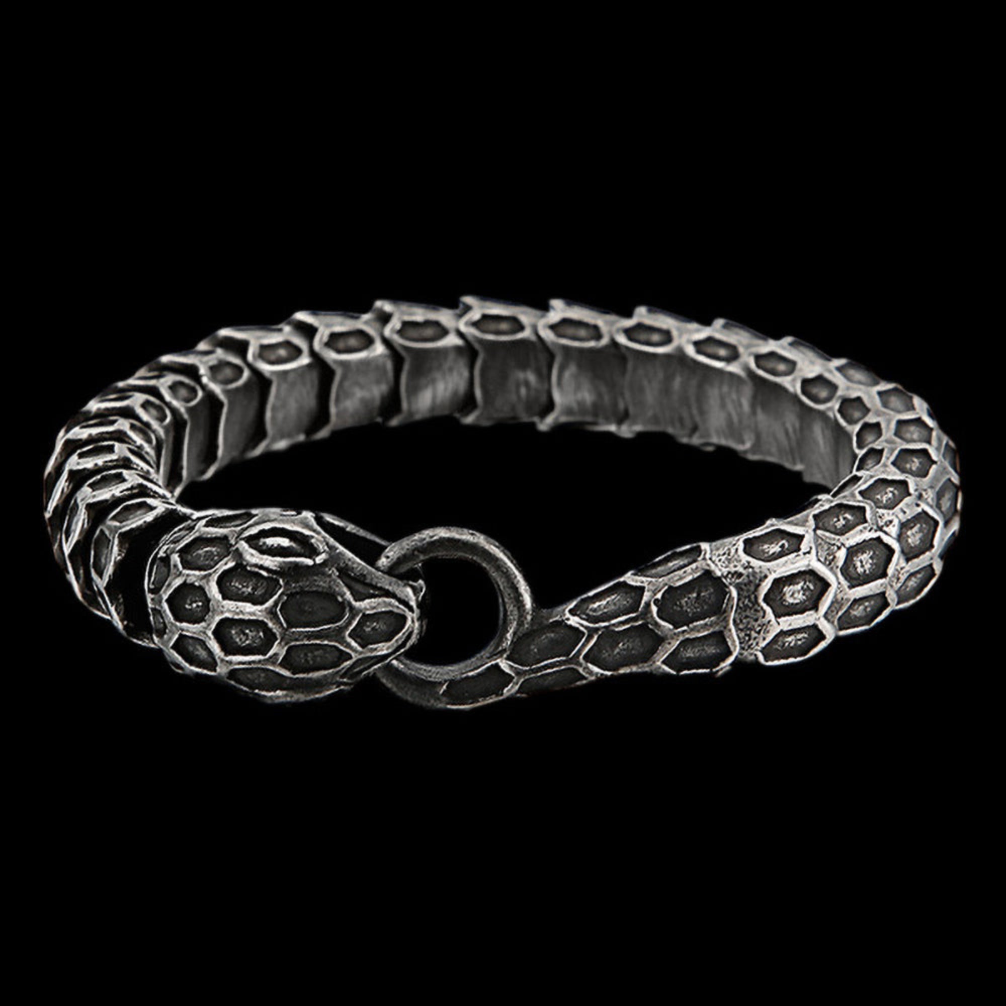 Side view stainless steel snake uroboros men's bracelet.
