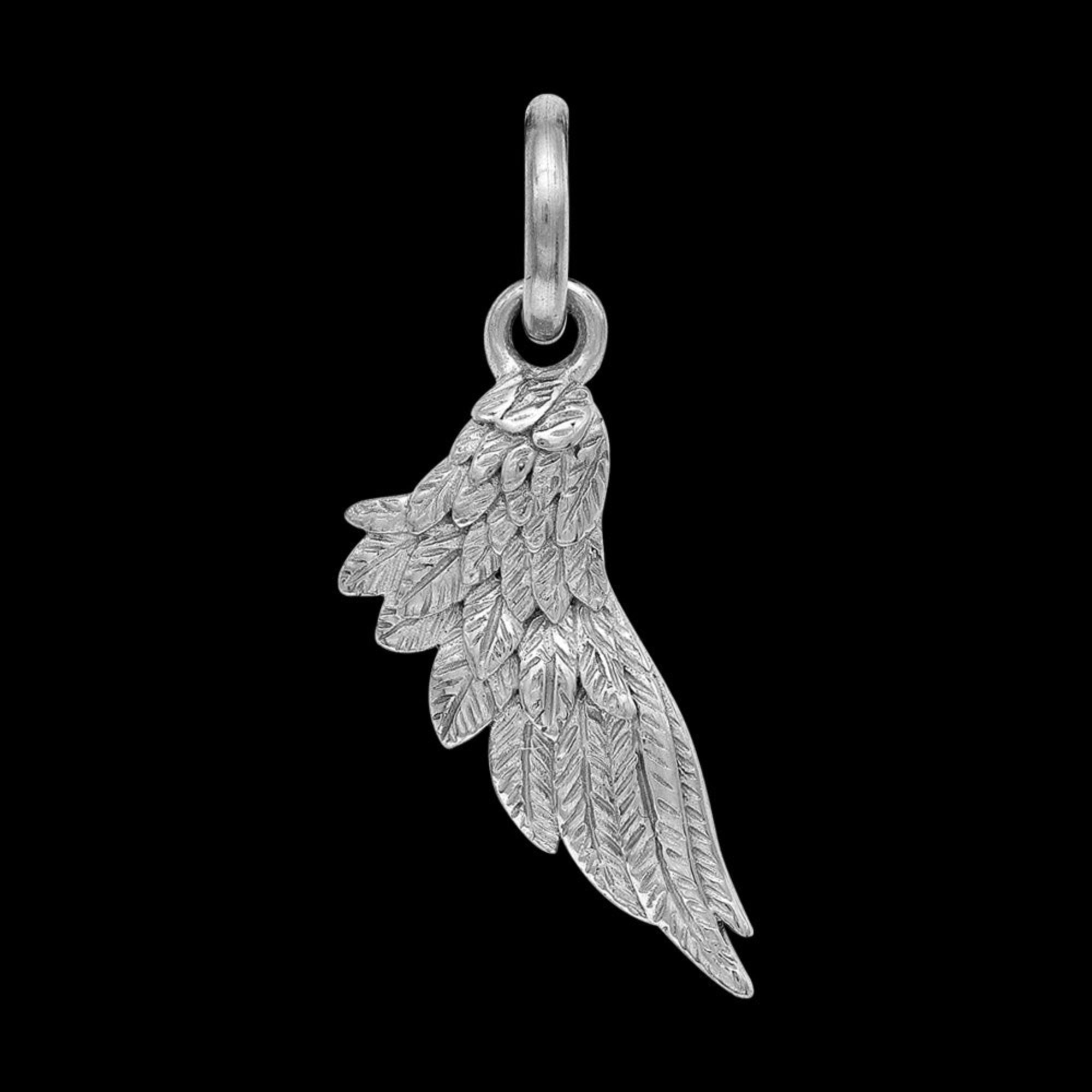 Close-up of wing pendant from men's faith cross & wing stainless steel necklace.